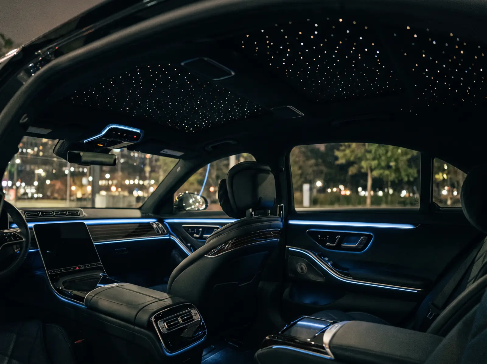 Mercedes S-Class interior at night with a fiber-optic starlight headliner